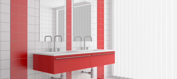 modern bathroom with red and white tiles on wall and floor