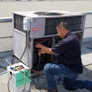 Alex working on Douglas PH AC unit - Picture#2 Alex working on Douglas PH AC unit - Picture#2