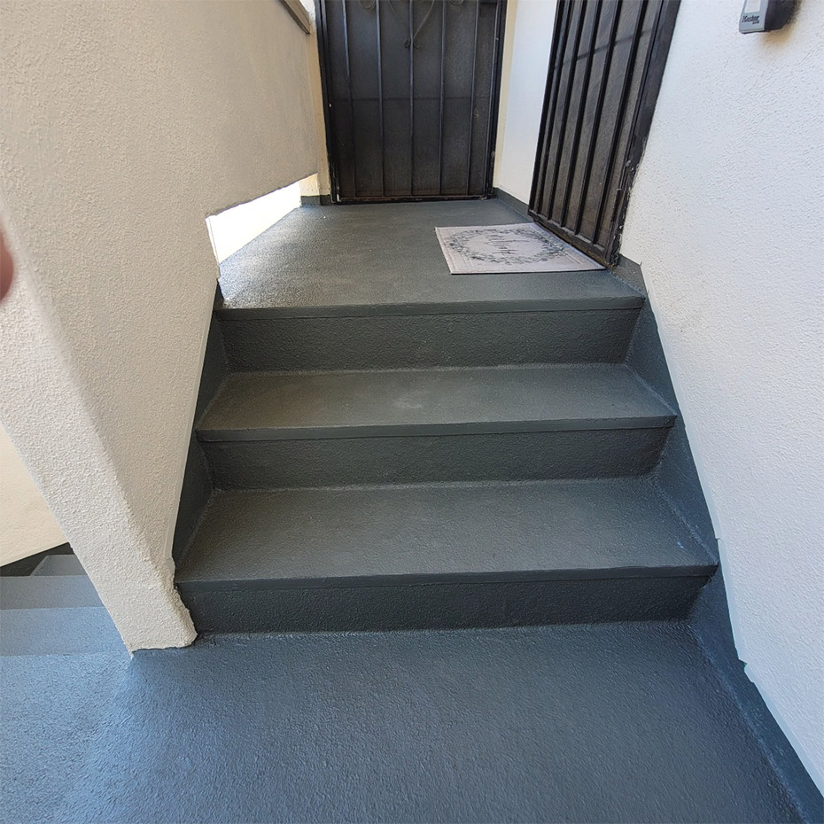McKowski’s replaced all the surface wood and metal flashings and then applied, Excellent Coatings Fire Rated Decking System to the stairs and landings.