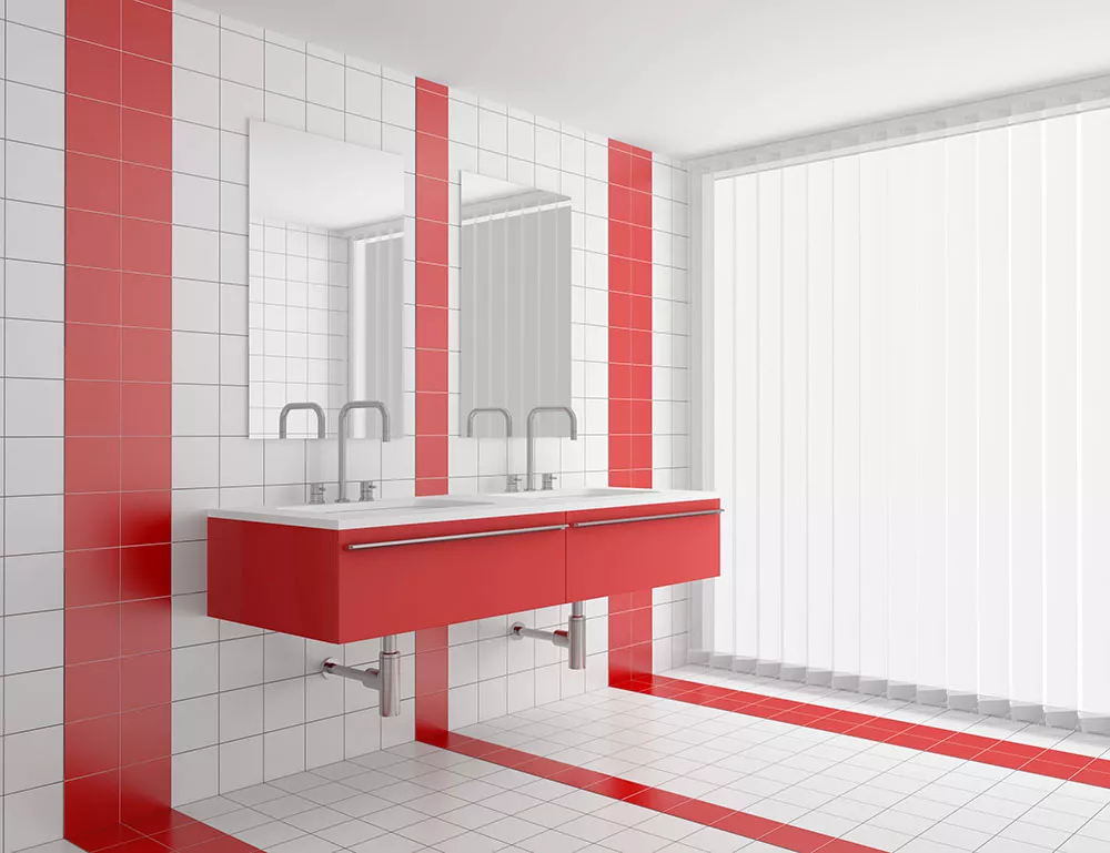 modern bathroom with red and white tiles on wall and floor